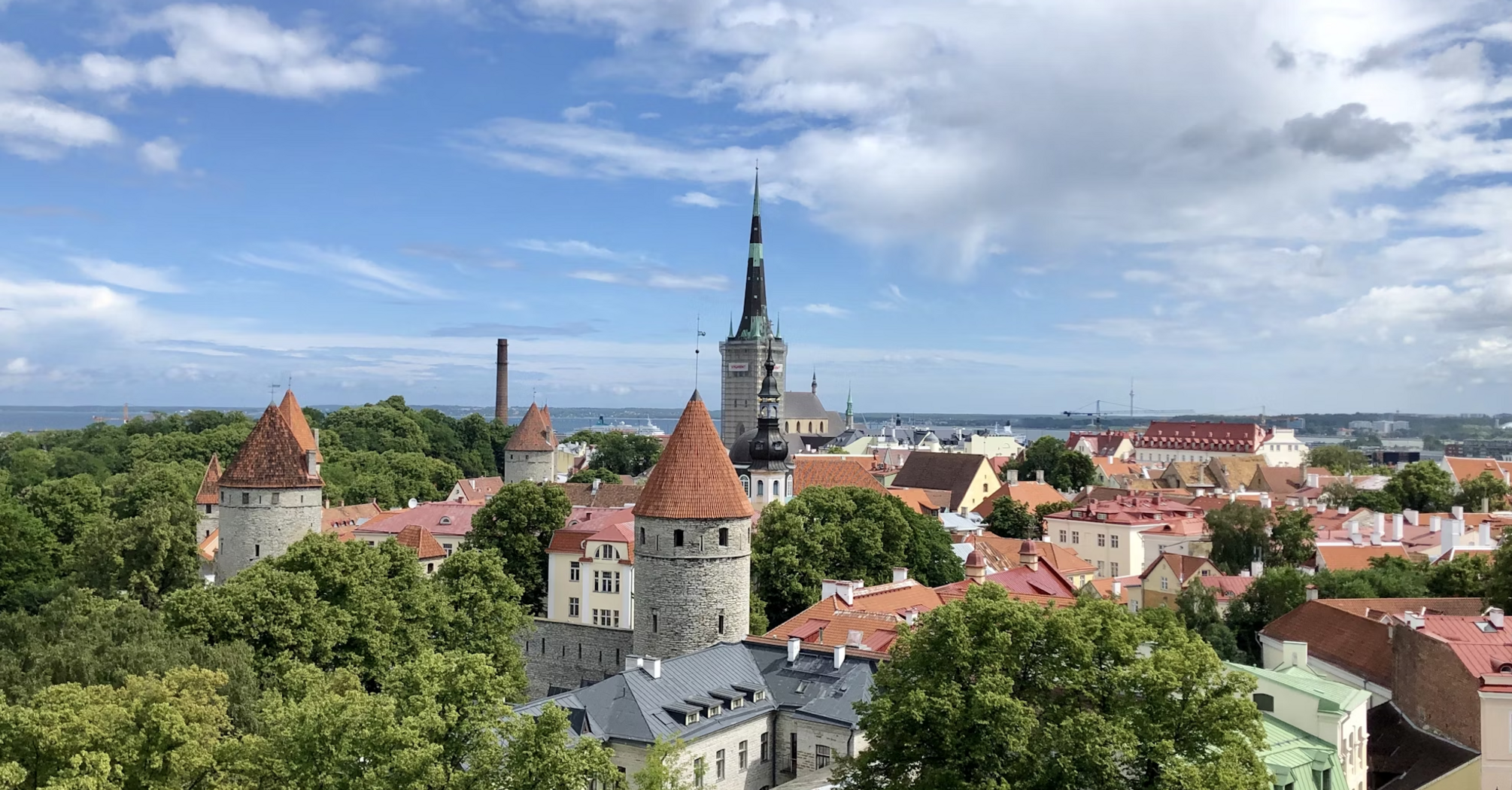 Aerial view of Tallinn's cityscape, showcasing modern buildings