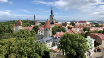 Aerial view of Tallinn's cityscape, showcasing modern buildings