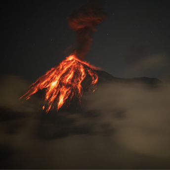 Erupting volcano at night with glowing lava flows and ash plume