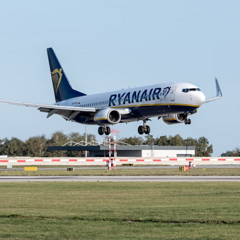 Ryanair aircraft landing at an airport runway