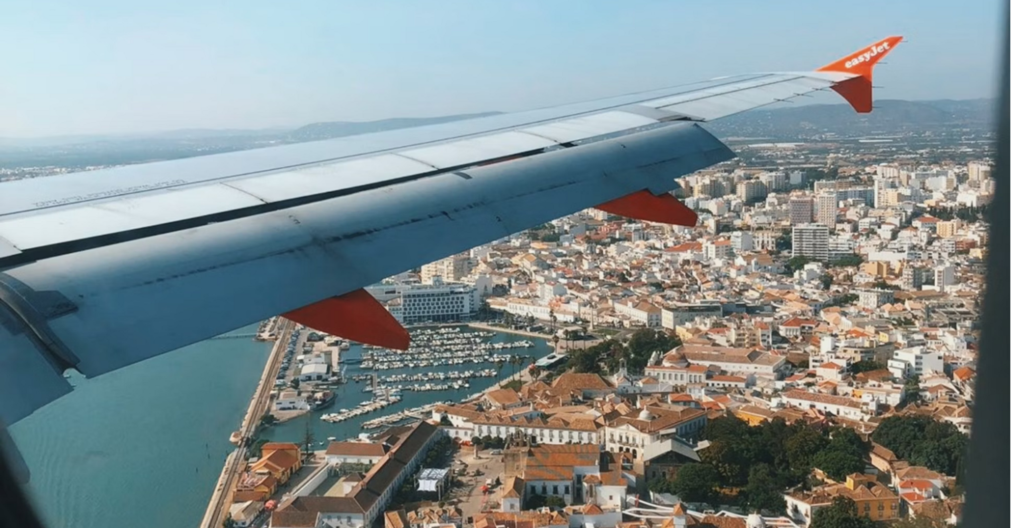 View of Faro, Portugal through an easyJet airplane window