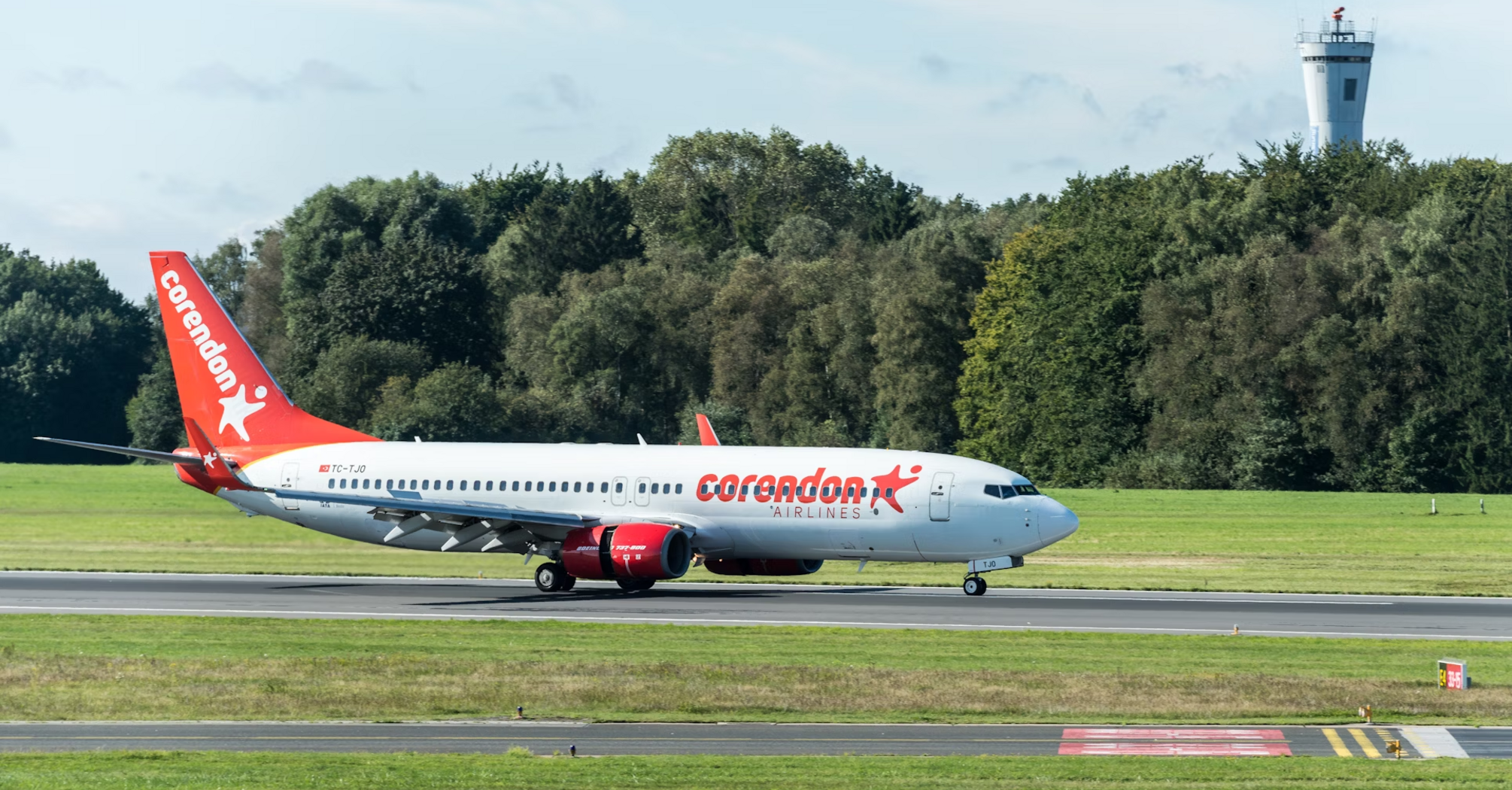 Corendon Airlines aircraft on runway preparing for departure