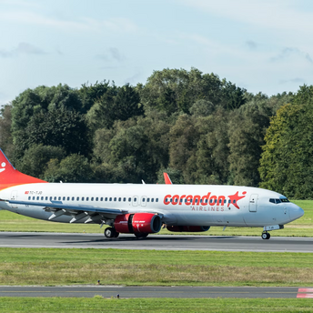 Corendon Airlines aircraft on runway preparing for departure