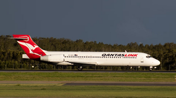 QantasLink aircraft taxiing on runway