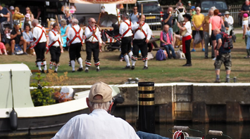 Man watches Morris dancers
