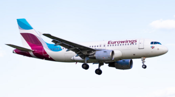 Eurowings aircraft landing with landing gear deployed
