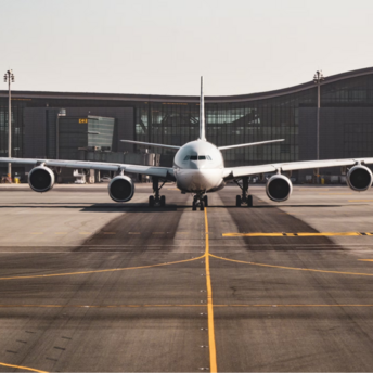 Passenger aircraft on runway at modern airport