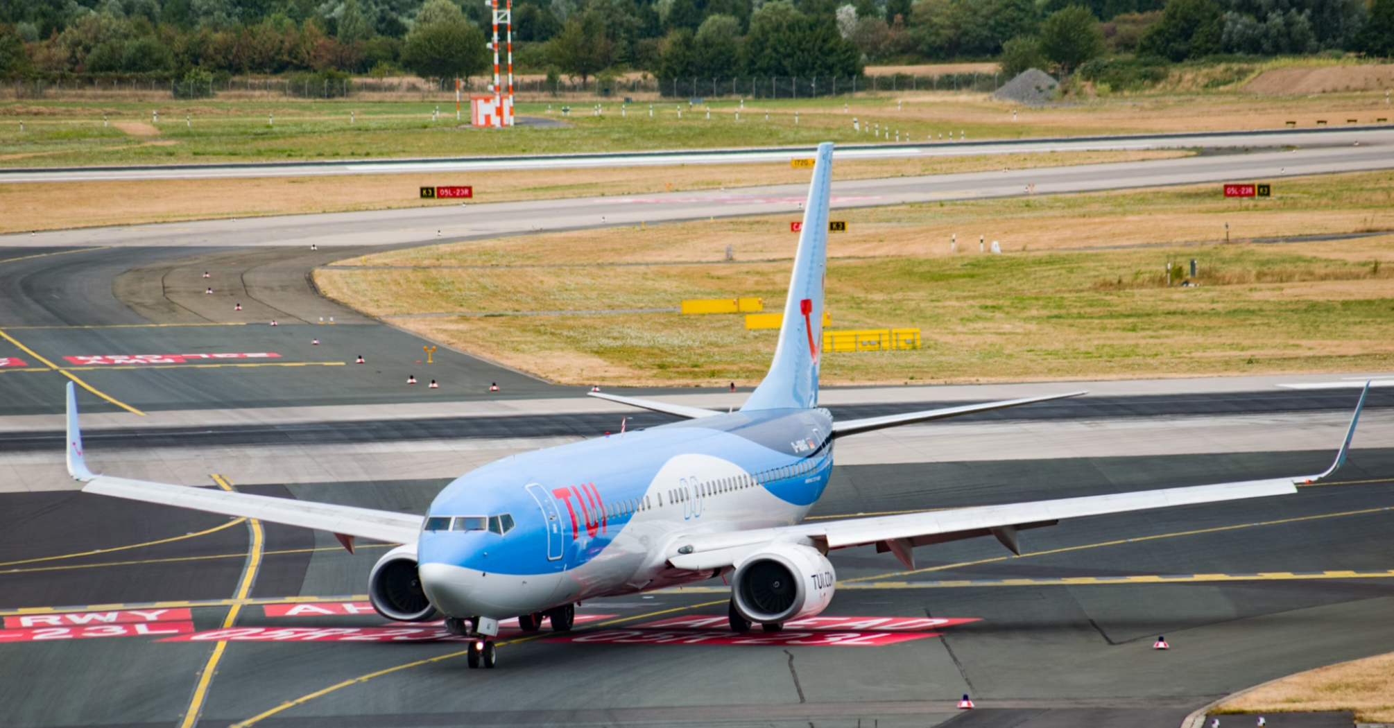 TUI Airways aircraft taxiing on runway