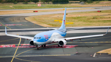 TUI Airways aircraft taxiing on runway