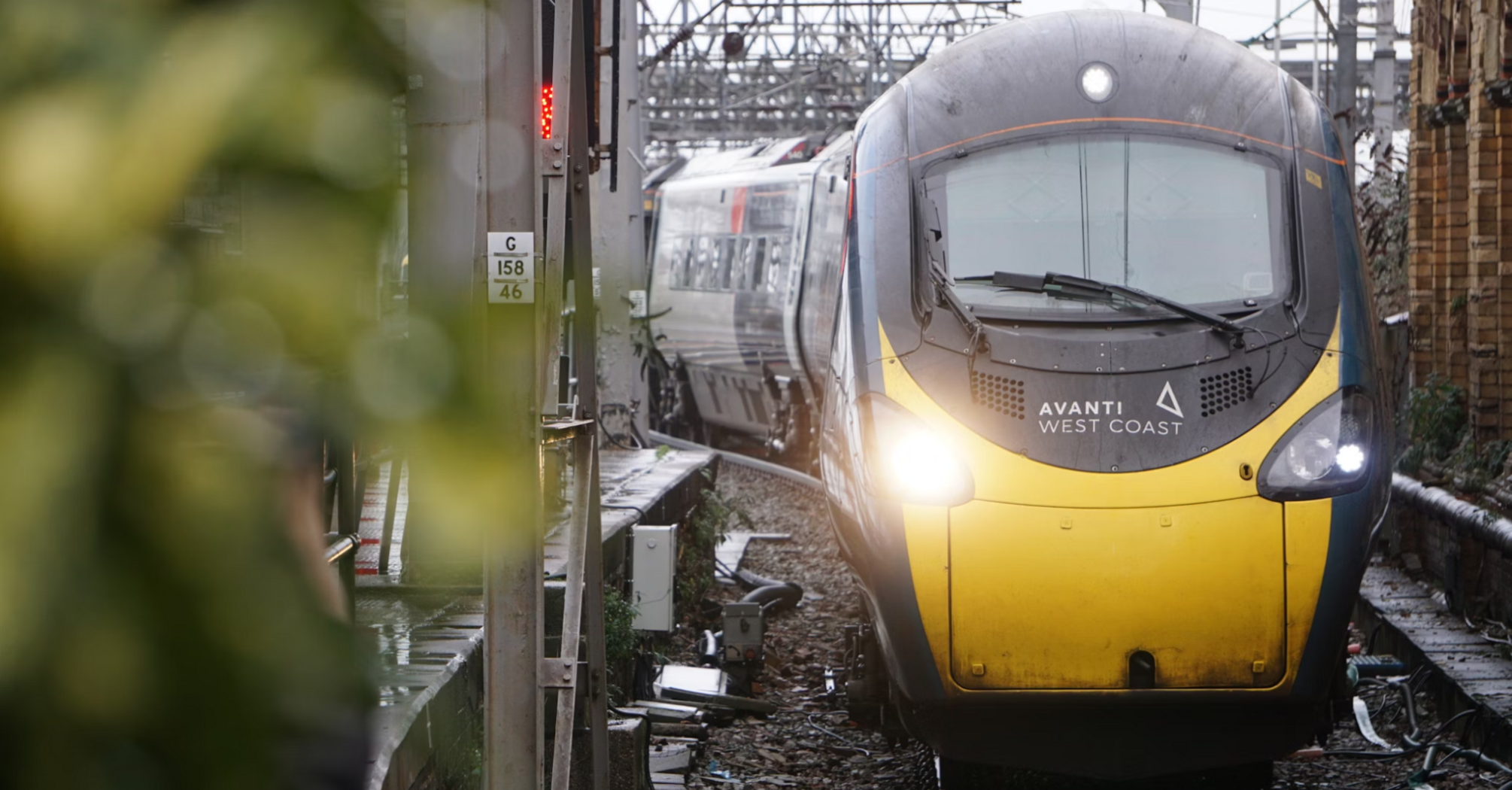 An Avanti West Coast train traveling on railway tracks