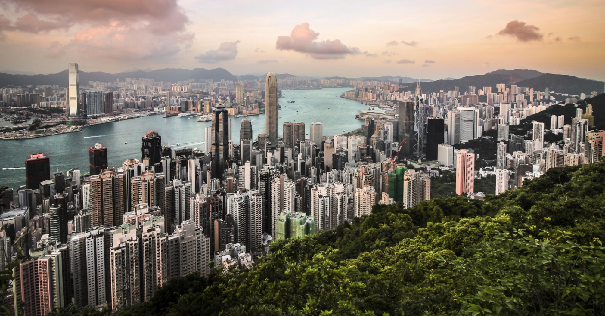 A panoramic view of Hong Kong’s skyline and harbor from Victoria Peak at sunset