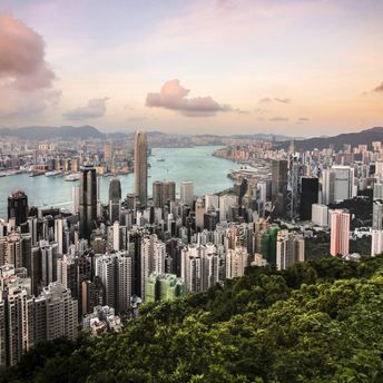 A panoramic view of Hong Kong’s skyline and harbor from Victoria Peak at sunset