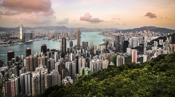 A panoramic view of Hong Kong’s skyline and harbor from Victoria Peak at sunset