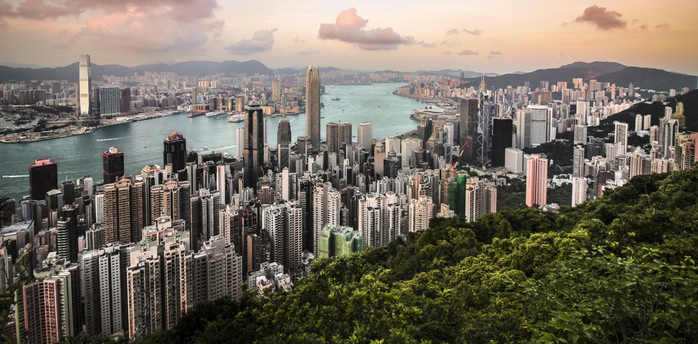 A panoramic view of Hong Kong’s skyline and harbor from Victoria Peak at sunset