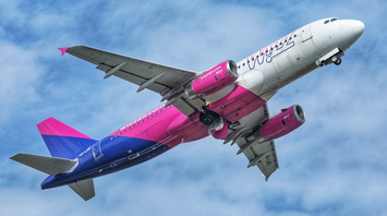 Wizz Air airplane ascending into the sky