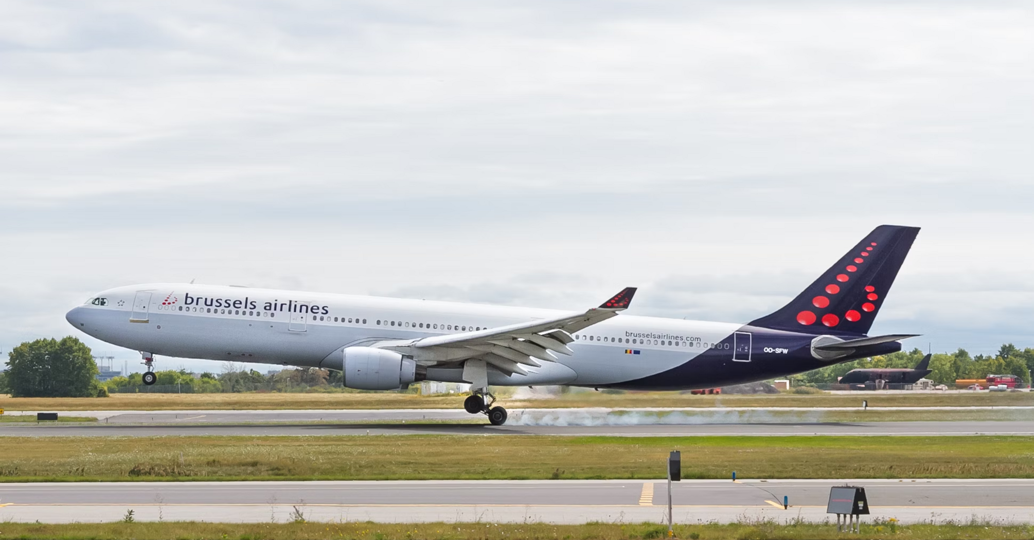 Brussels Airlines aircraft touching down on runway