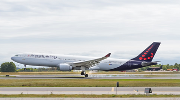 Brussels Airlines aircraft touching down on runway
