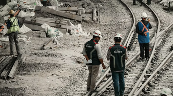 Rail workers at track reconstruction site