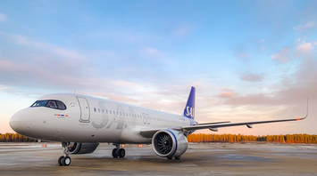SAS aircraft parked at sunset ahead of SkyTeam system updates