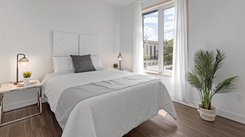 Minimalist hotel room with natural light and modern decor