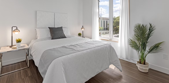 Minimalist hotel room with natural light and modern decor