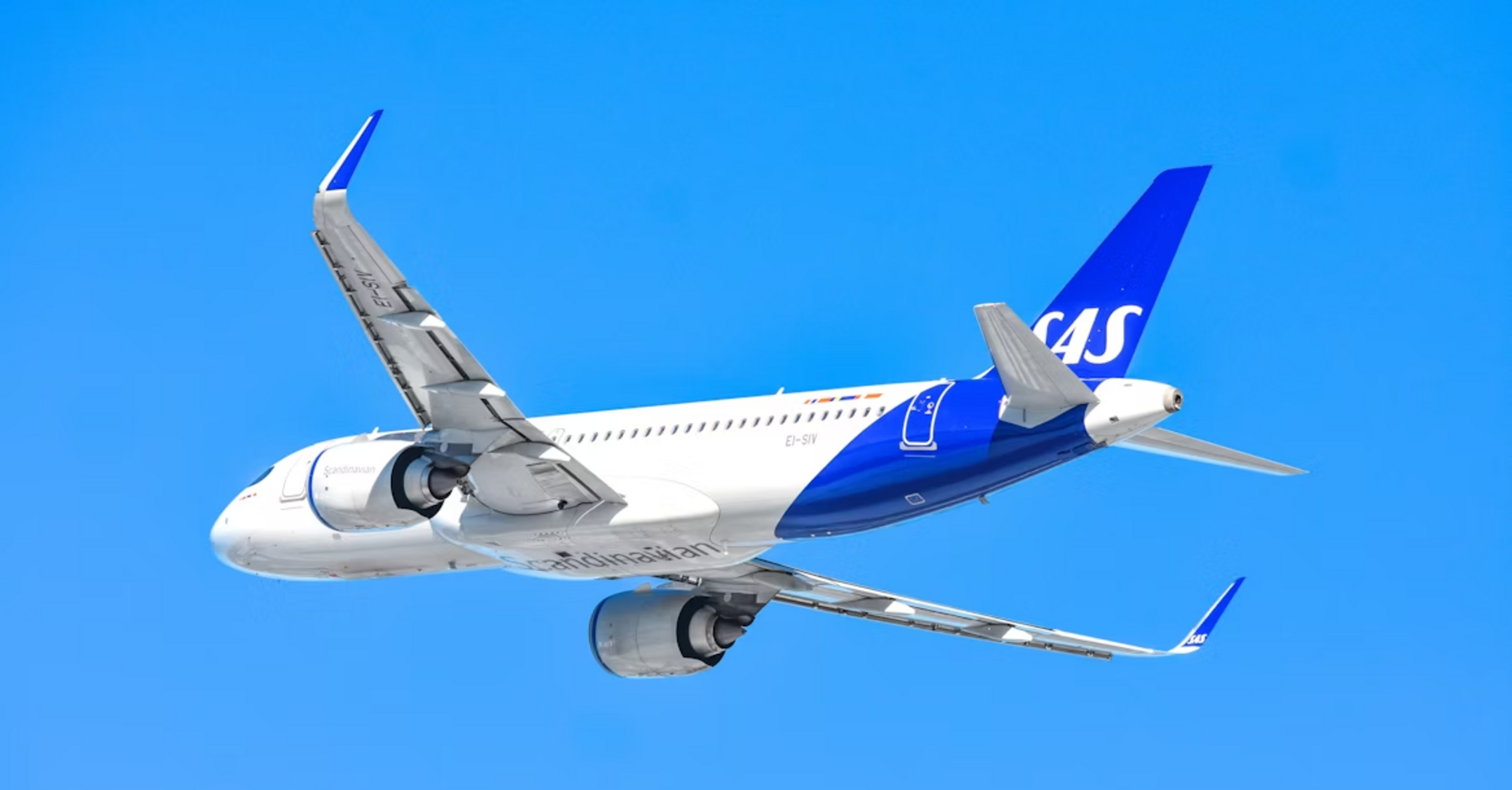 SAS aircraft in flight against clear blue sky