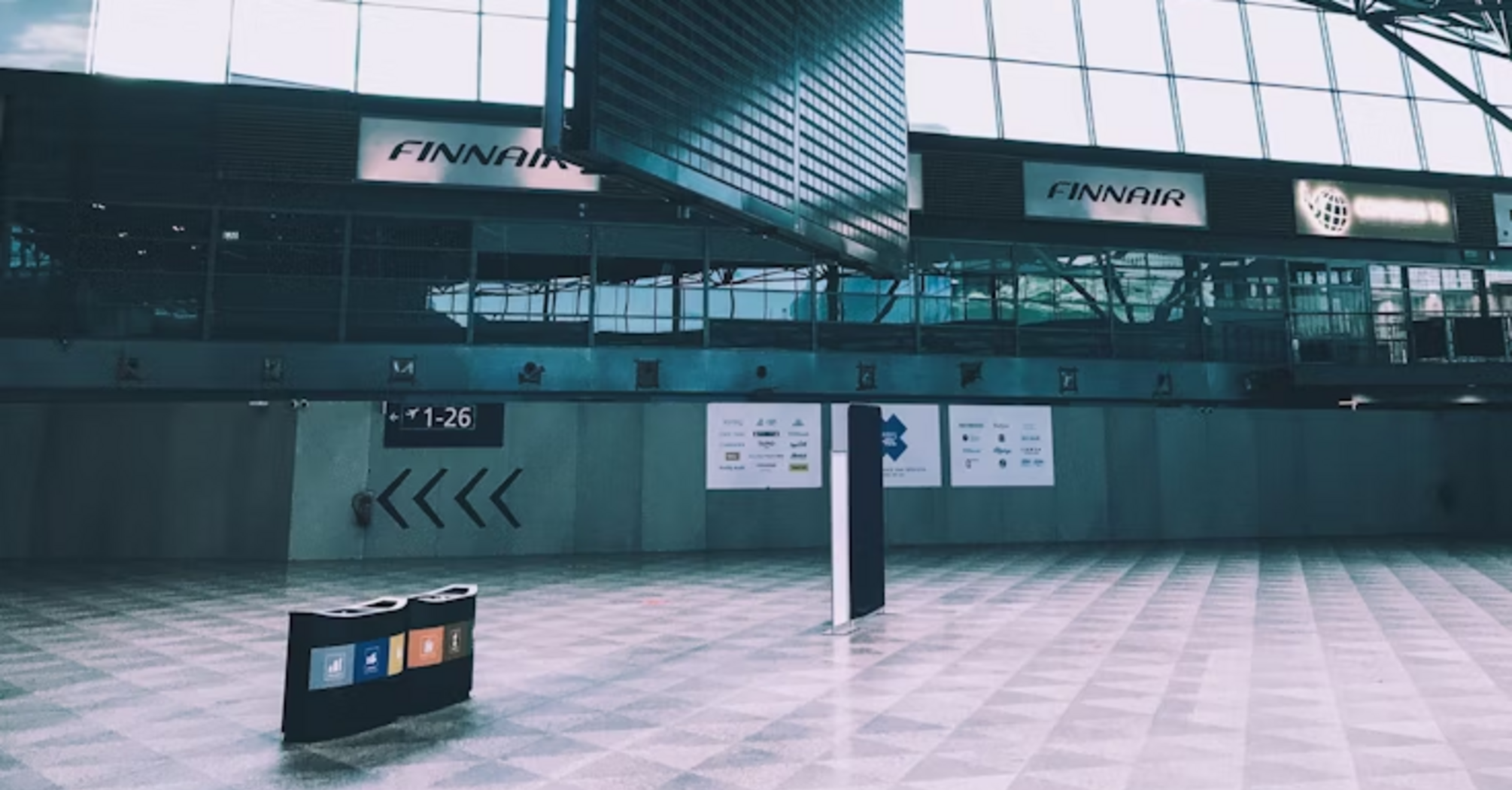 Empty departure board at Helsinki Airport terminal during operational disruption
