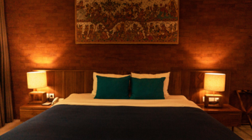 Cozy hotel room with warm lighting and decorative wall art