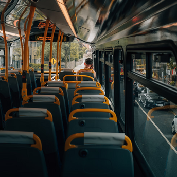 View from inside a nearly empty bus during daytime