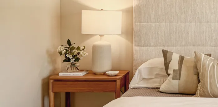 Cozy hotel bedroom with modern decor and soft lighting