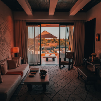 Resort suite with terrace and tropical view