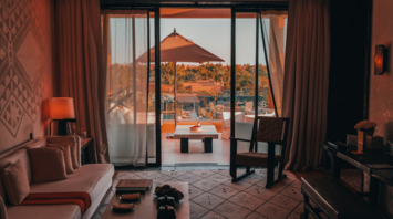 Resort suite with terrace and tropical view