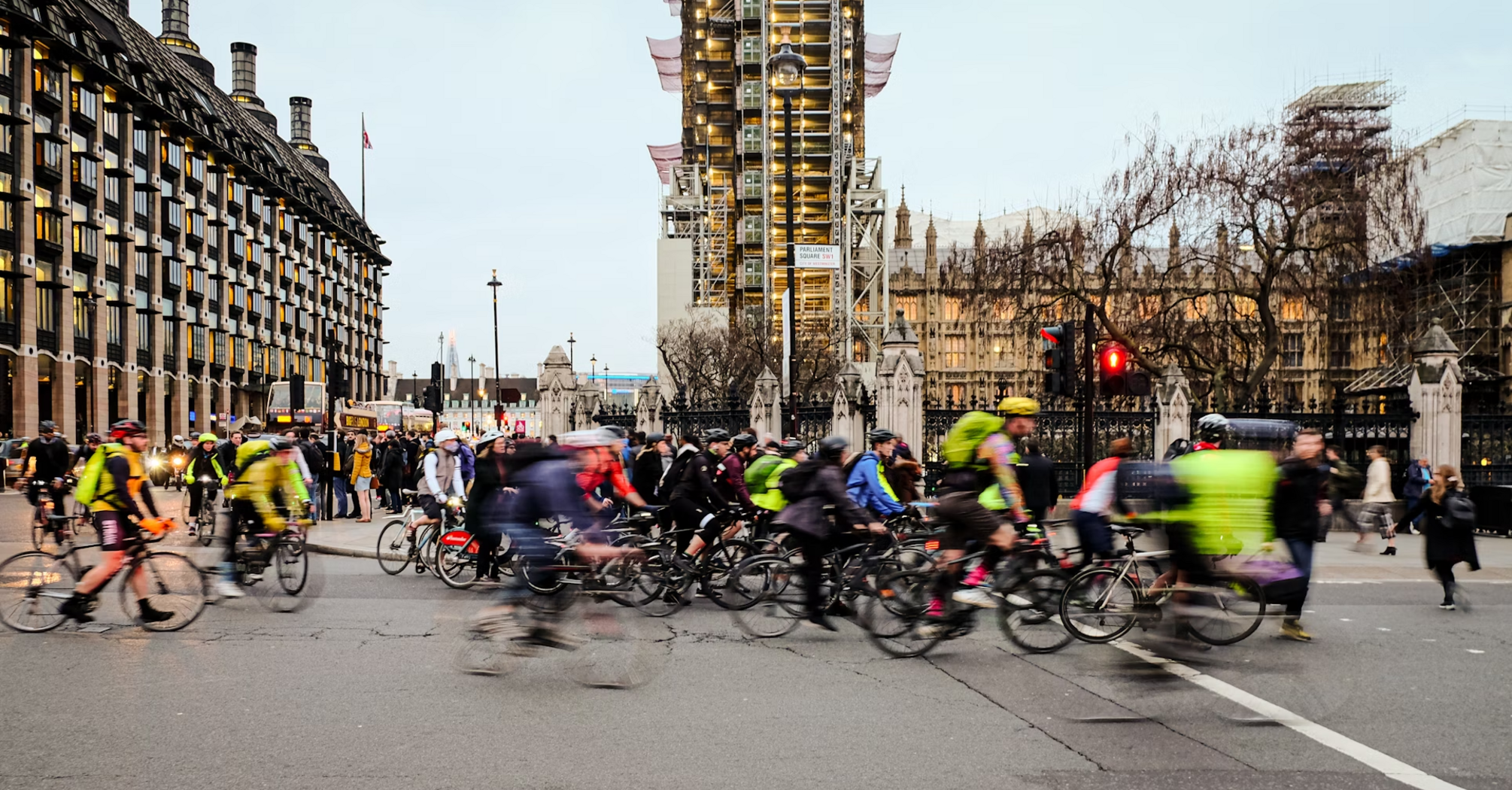 Cyclists riding through central London during a large group event