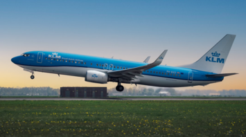 KLM aircraft taking off from runway during sunrise