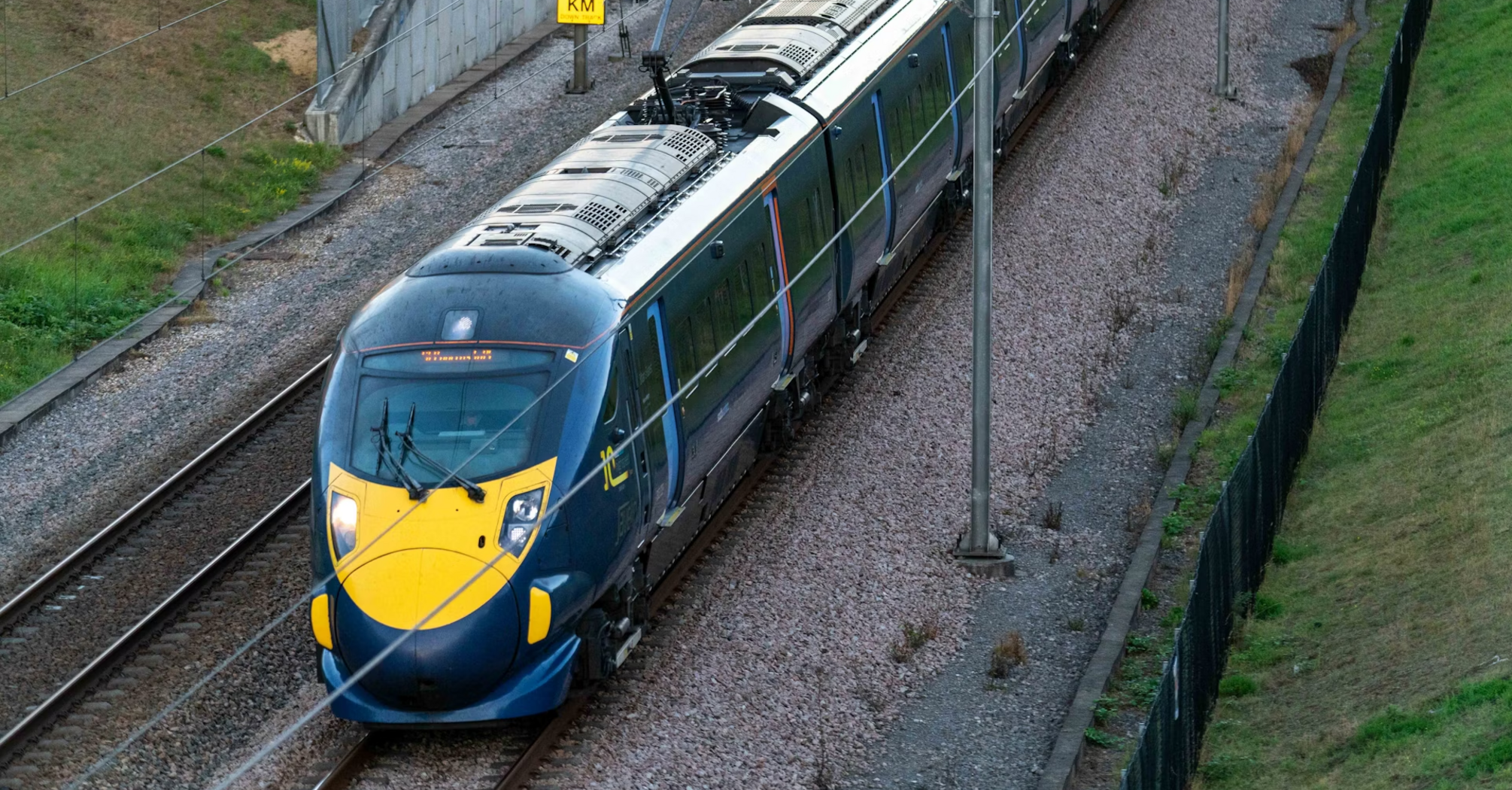 Electric passenger train travelling on mainline track