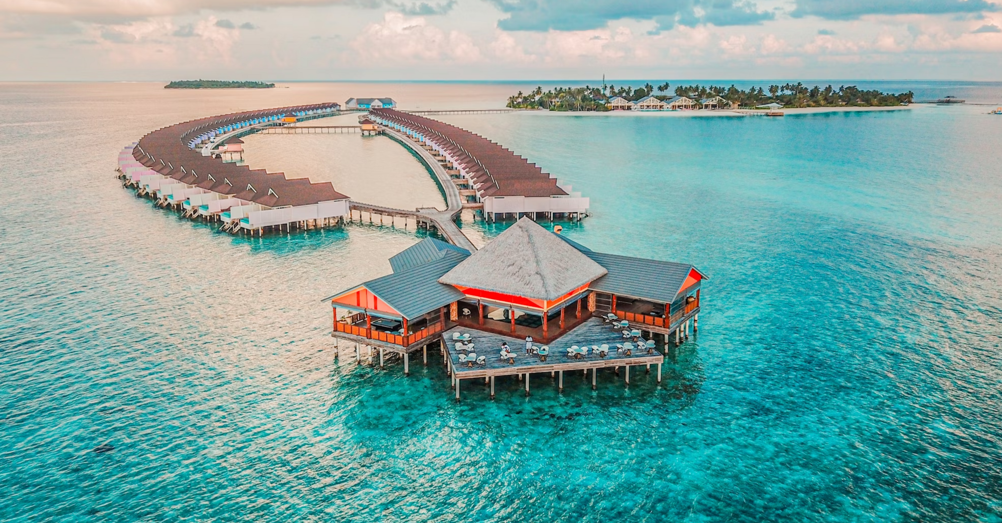 Overwater villas and main building in Baa Atoll, Maldives
