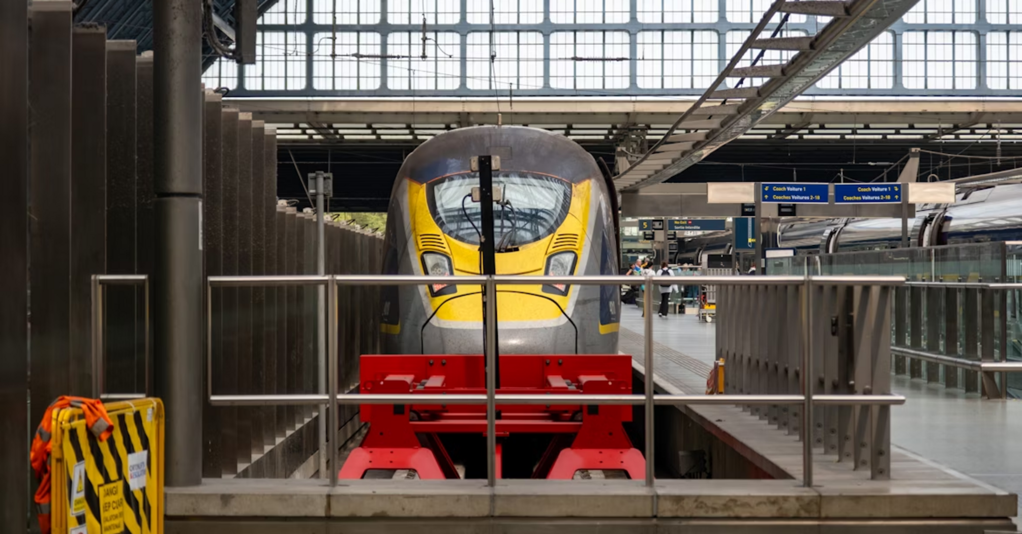 Eurostar train at a platform inside a modern railway station