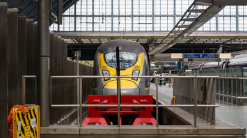 Eurostar train at a platform inside a modern railway station