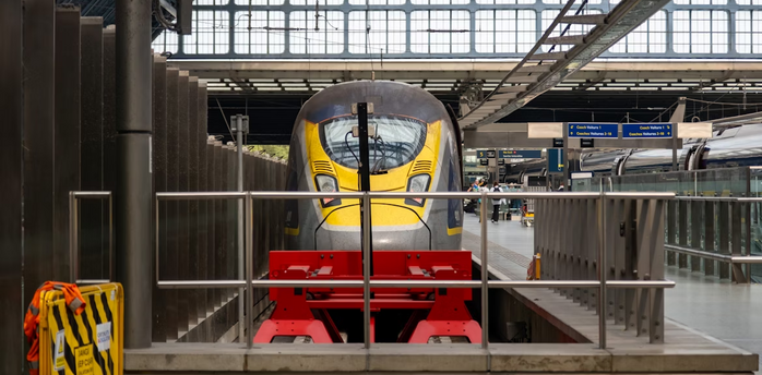 Eurostar train at a platform inside a modern railway station