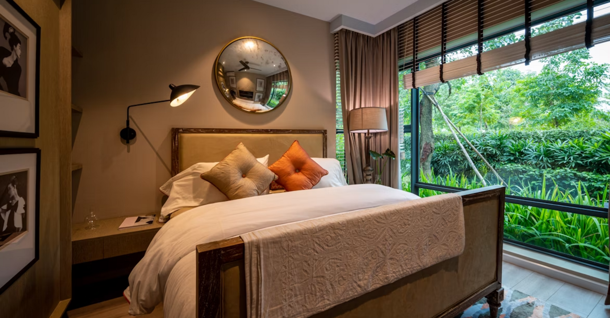 Interior of a Kimpton Ubud guest room with garden view