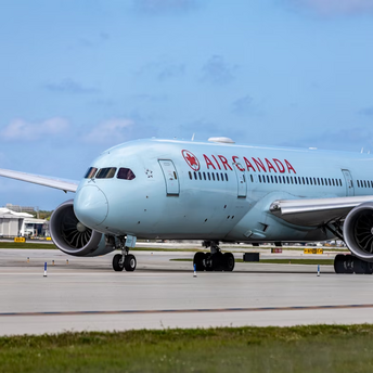 Air Canada aircraft taxiing at the airport