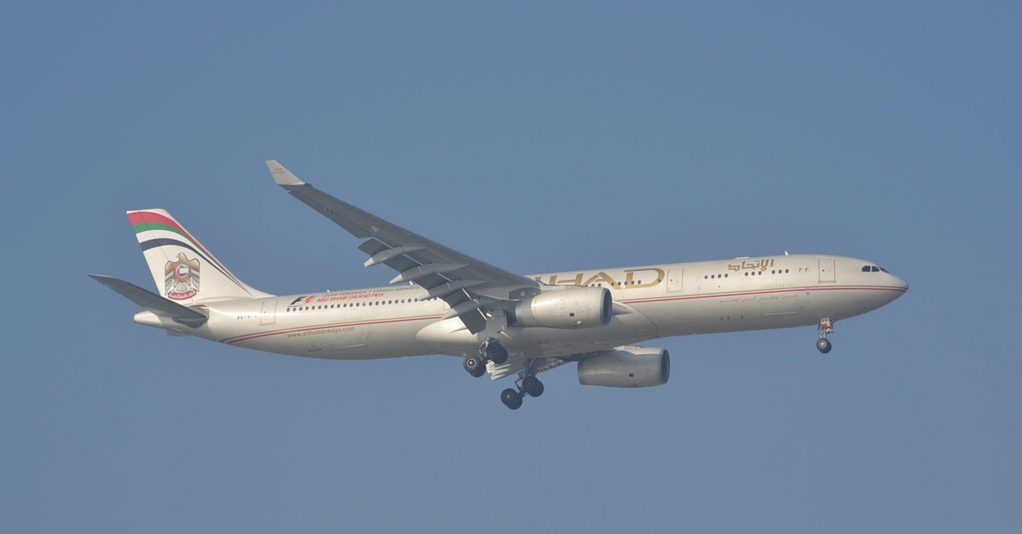 Etihad Airways aircraft approaching for landing under clear skies