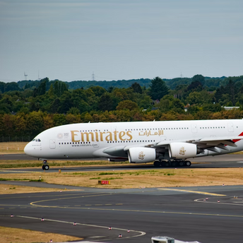 Emirates A380 aircraft taxiing on runway