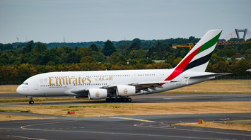 Emirates A380 aircraft taxiing on runway