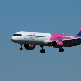 Wizz Air aircraft approaching landing in clear sky