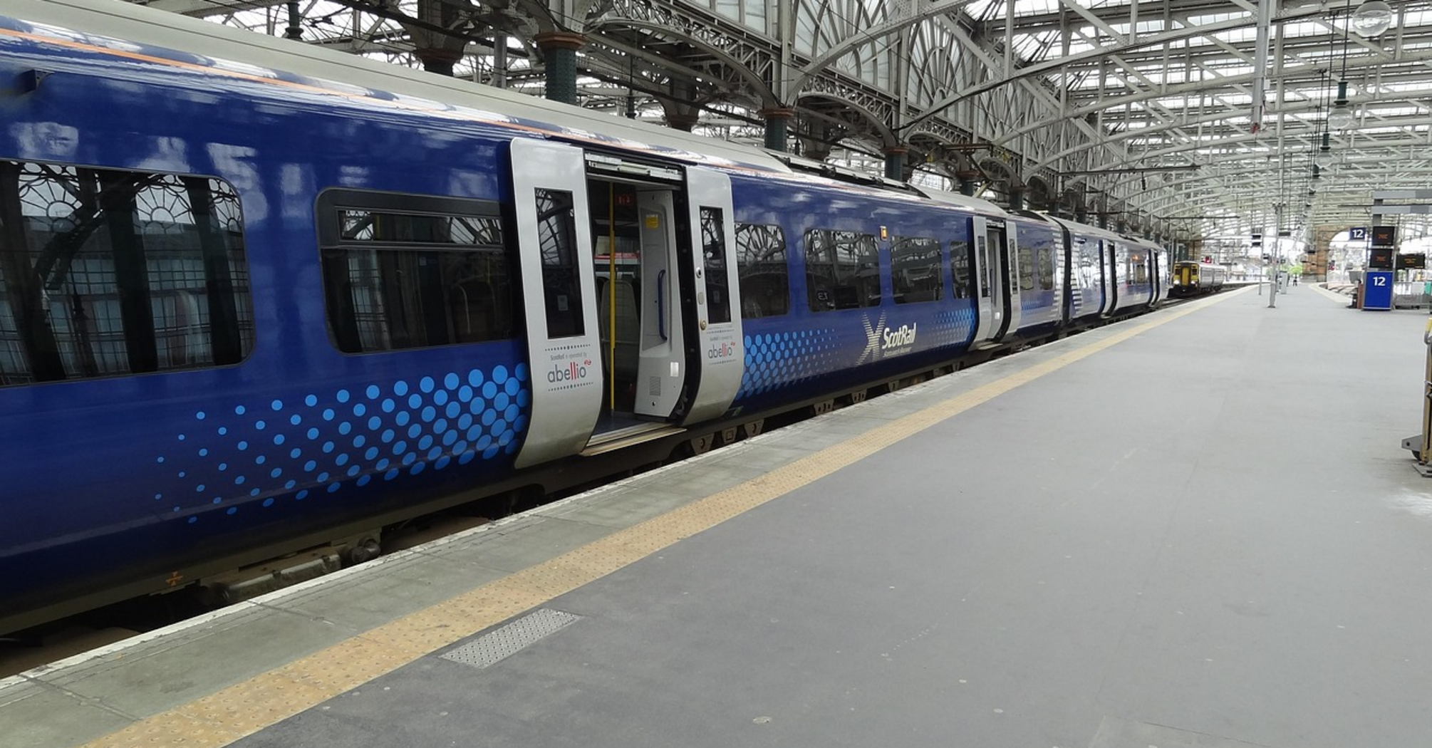 ScotRail train at an empty station platform