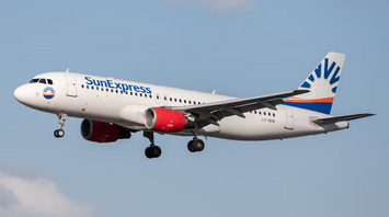SunExpress aircraft in flight before landing