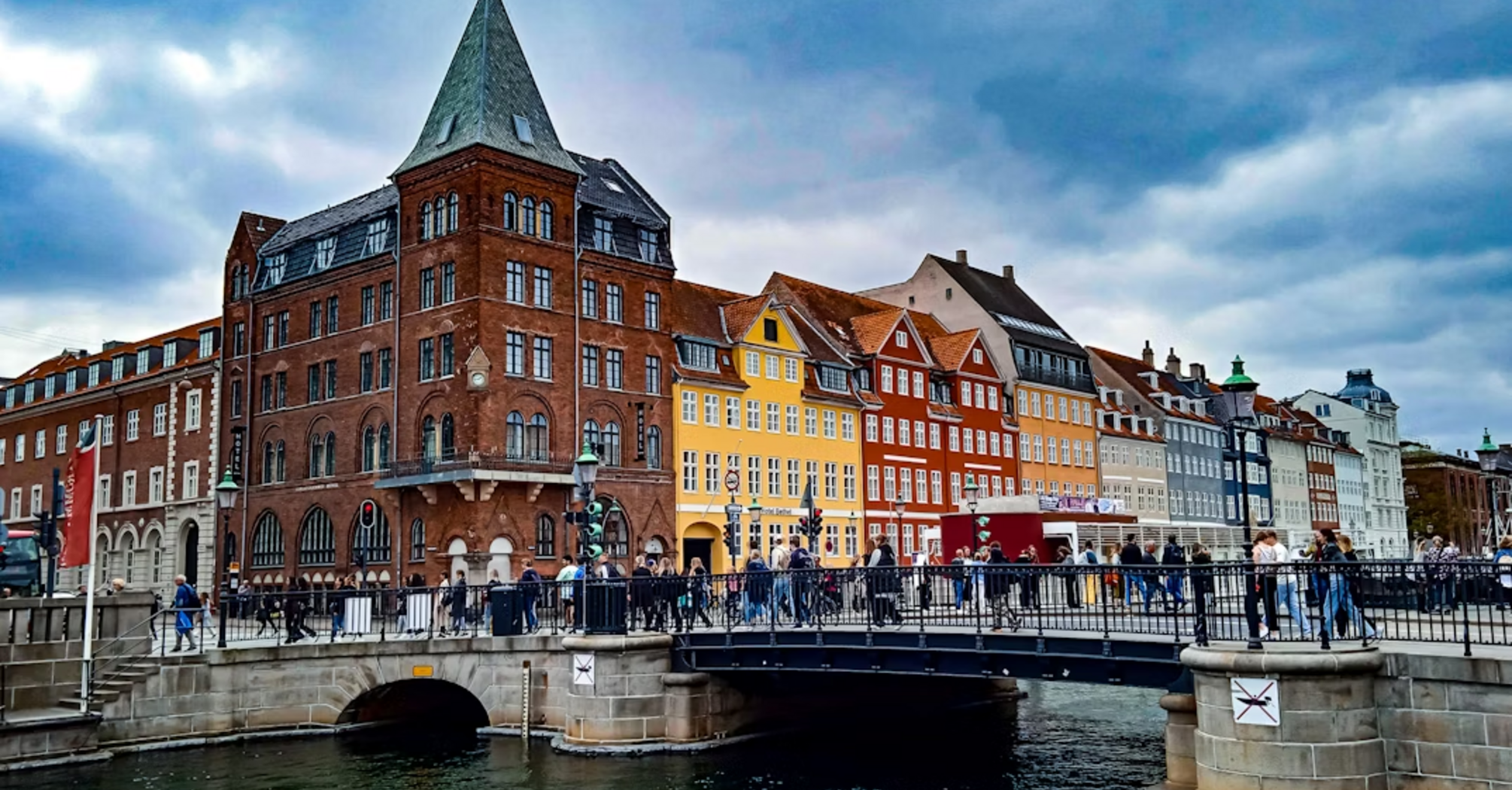 Bridge and colorful buildings in central Copenhagen near the canal