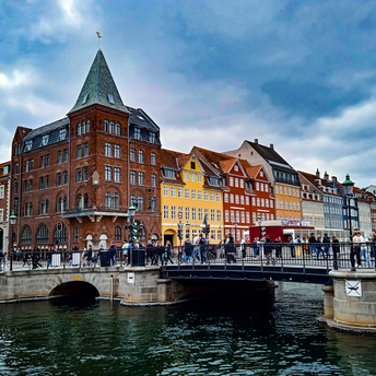 Bridge and colorful buildings in central Copenhagen near the canal
