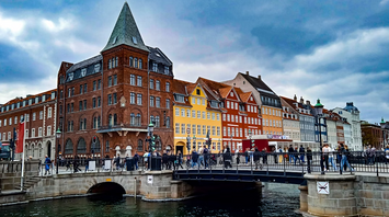 Bridge and colorful buildings in central Copenhagen near the canal
